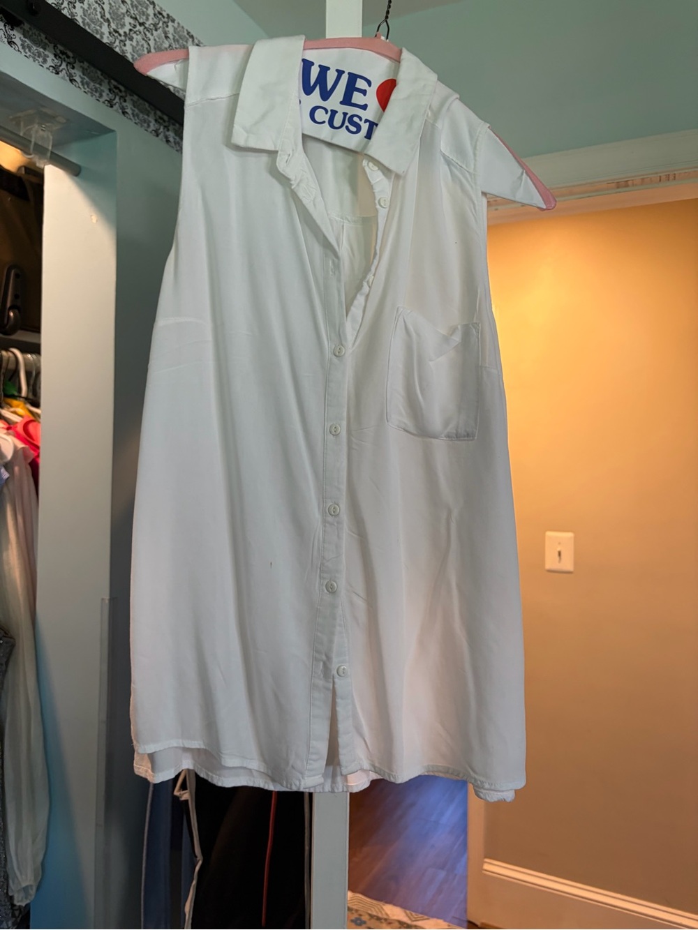 White Sleeveless Button-Front Ladies Shirt